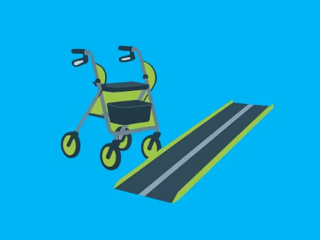 Rollator neben einer Flächenrampe vor blauem Hintergrund.